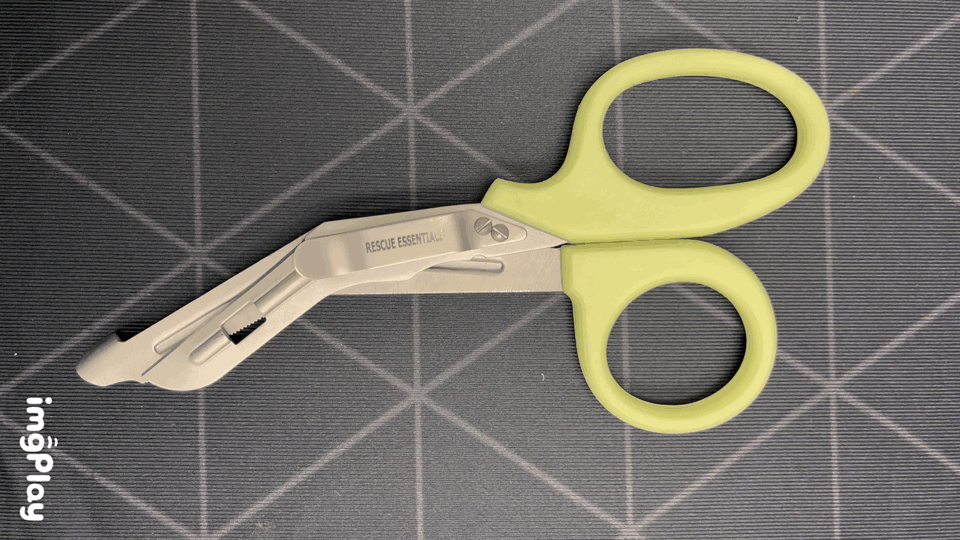 Glow-in-the-Dark Handled Shears, 7.5" with Clip, showing in light and dark