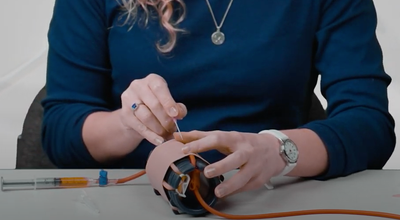 Multi-Insertion Training System (M.I.T.S.) Composite Trainer Kit, In use training on needle insertion